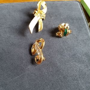 Avon brooches